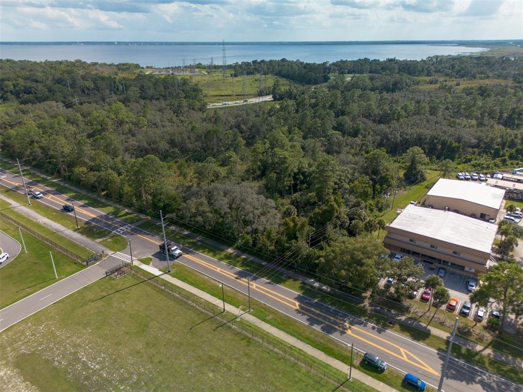 265 Enterprise Road Deltona, FL 32725 - Photo 16 of 24 a view of a lake with a mountain