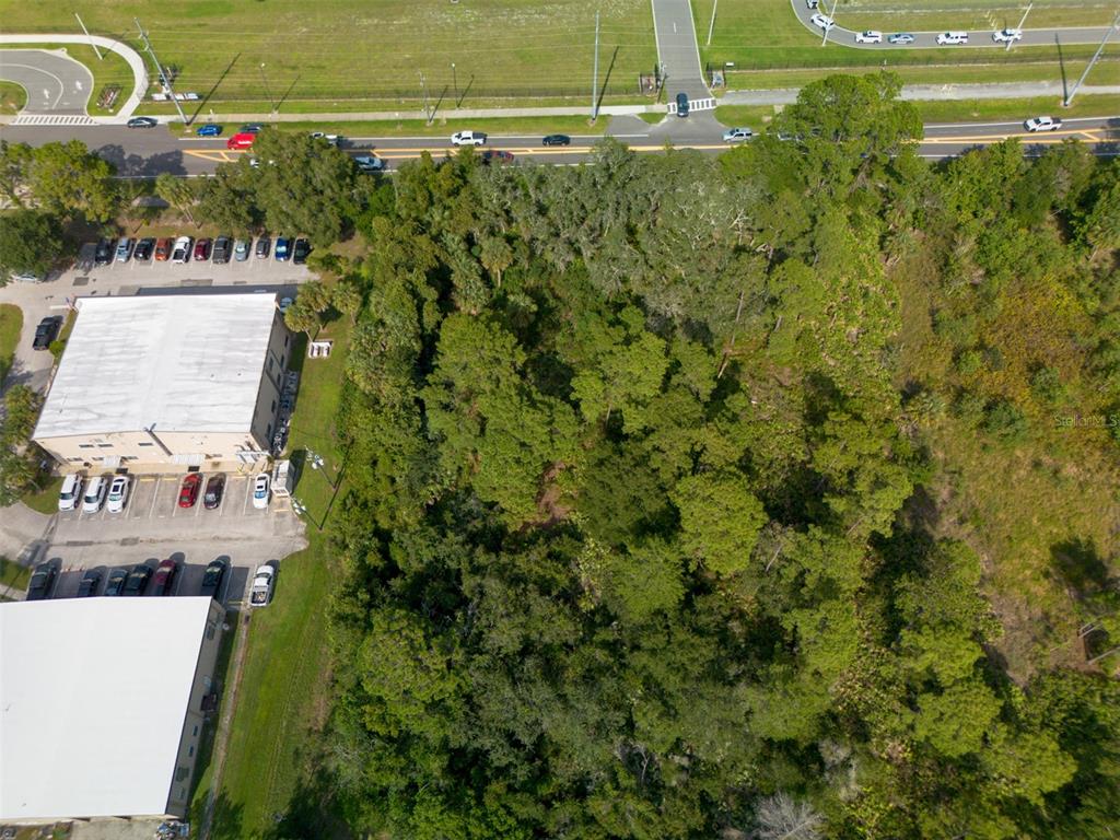 265 Enterprise Road Deltona, FL 32725 - Photo 19 of 24 an aerial view of a houses with a yard
