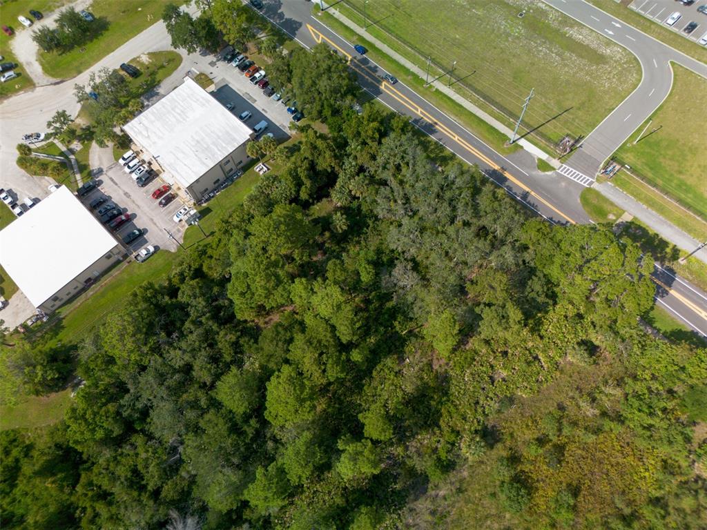 265 Enterprise Road Deltona, FL 32725 - Photo 2 of 24 an aerial view of a house with a yard