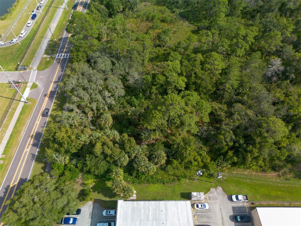 265 Enterprise Road Deltona, FL 32725 - Photo 23 of 24 an aerial view of a residential houses with yard