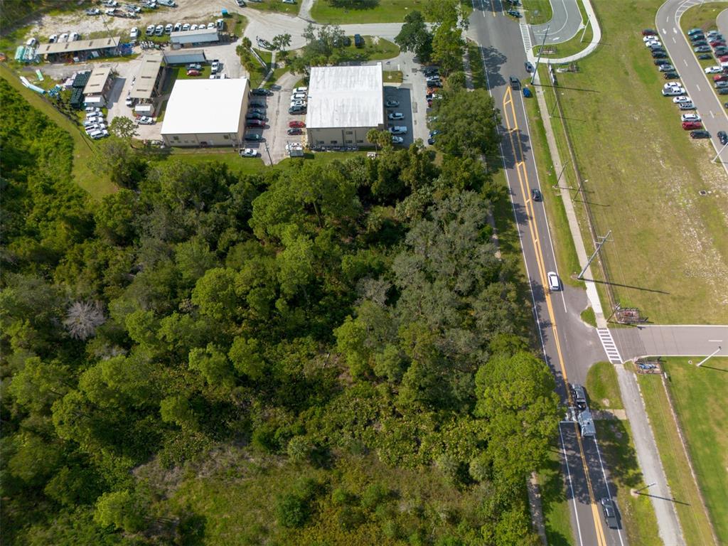 265 Enterprise Road Deltona, FL 32725 - Photo 3 of 24 an aerial view of a house with a yard