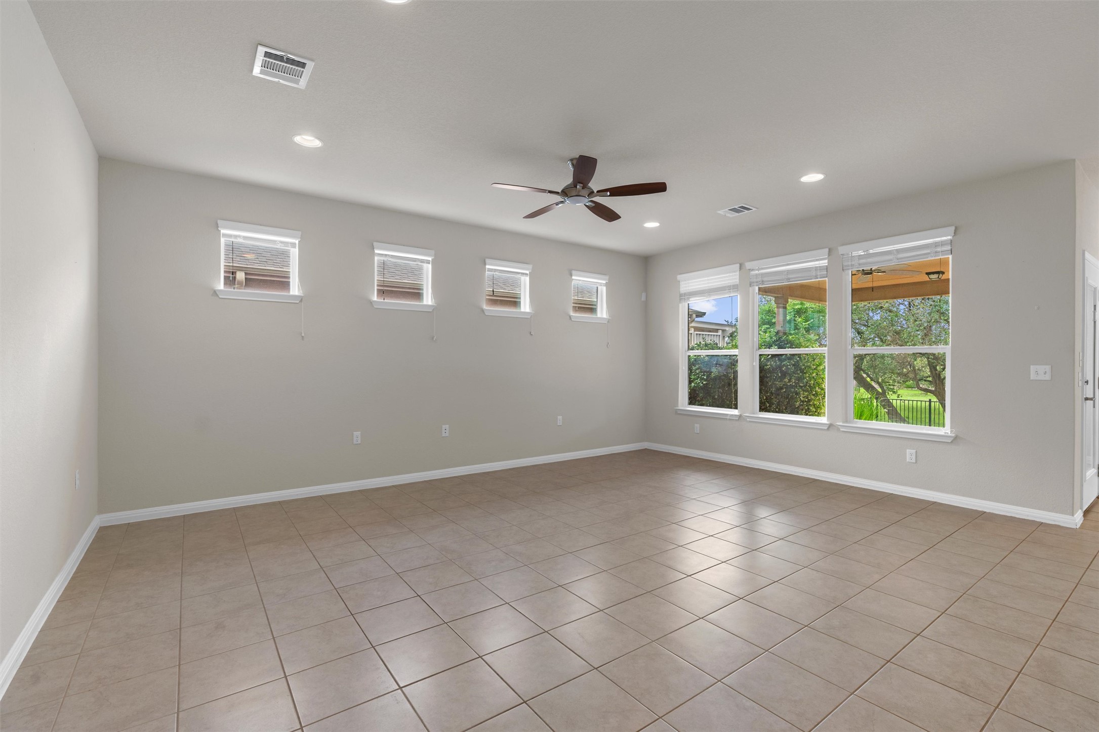 108 Calhoun Lane Georgetown, TX 78633 - Photo 6 of 32 a view of an empty room with a window