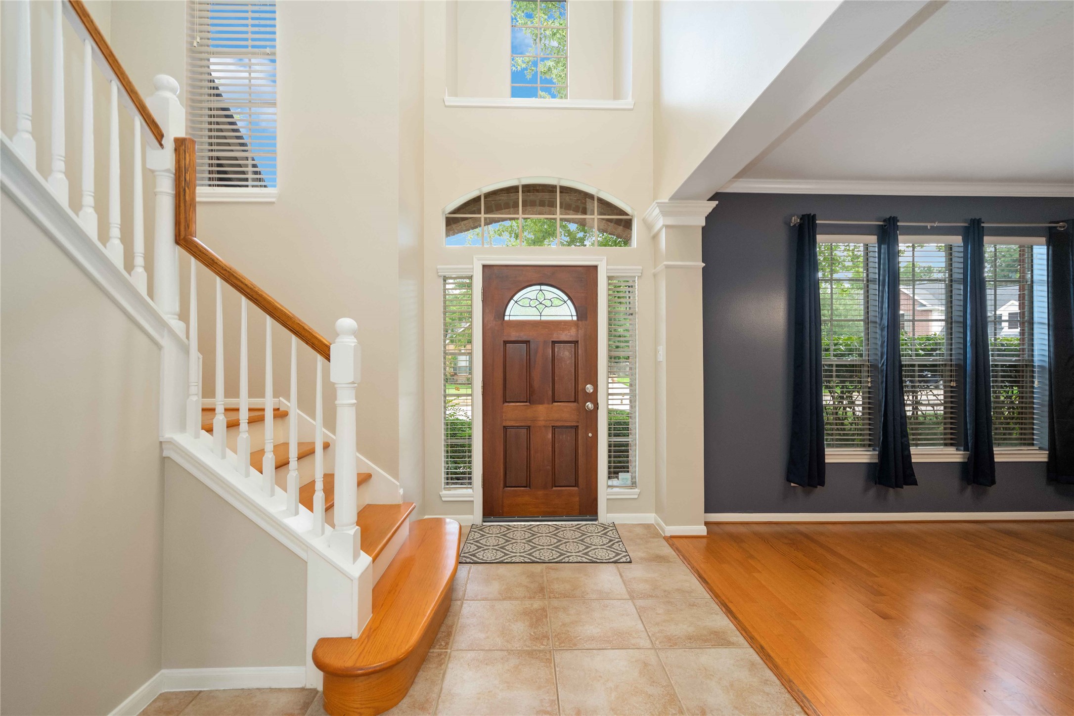 707 Lytton Springs Way Spring, TX 77373 - Photo 5 of 26 High ceilings, formal dining room, 3 bedrooms upstairs. Primary bedroom on the first floor.