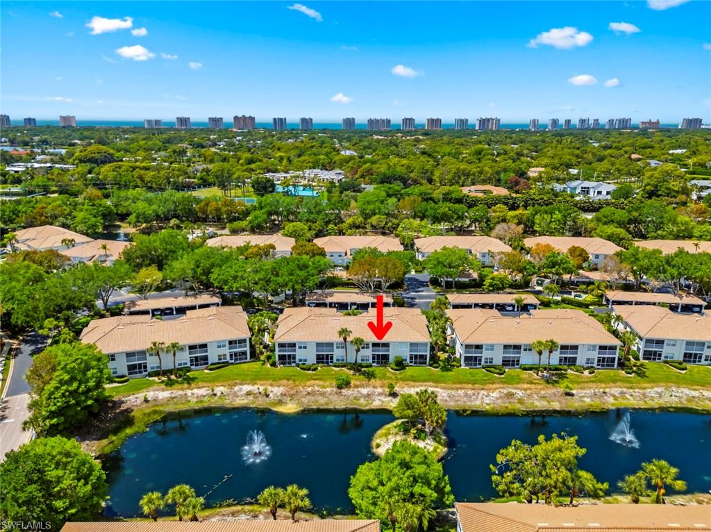 6812 Satinleaf Road South, Unit 202 Naples, FL 34109 - Photo 29 of 49 Lanai with Lake View
