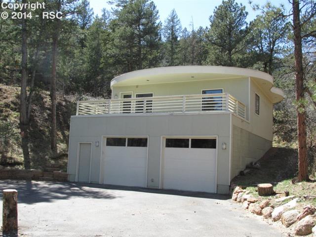 52 Upland Road Colorado Springs, CO 80906 - Photo 11 of 14 Detached 4 car tandem garage with 1,200 sq. ft. & 29 x 26 gym above