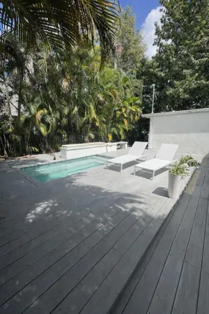 a view of a backyard of the house