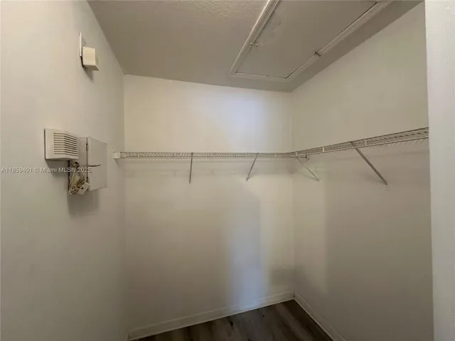 a view of a room with racks on the wall