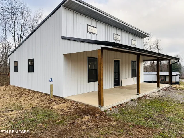 a house view with a outdoor space