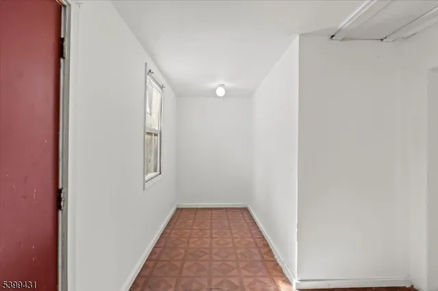 a view of a hallway with entryway