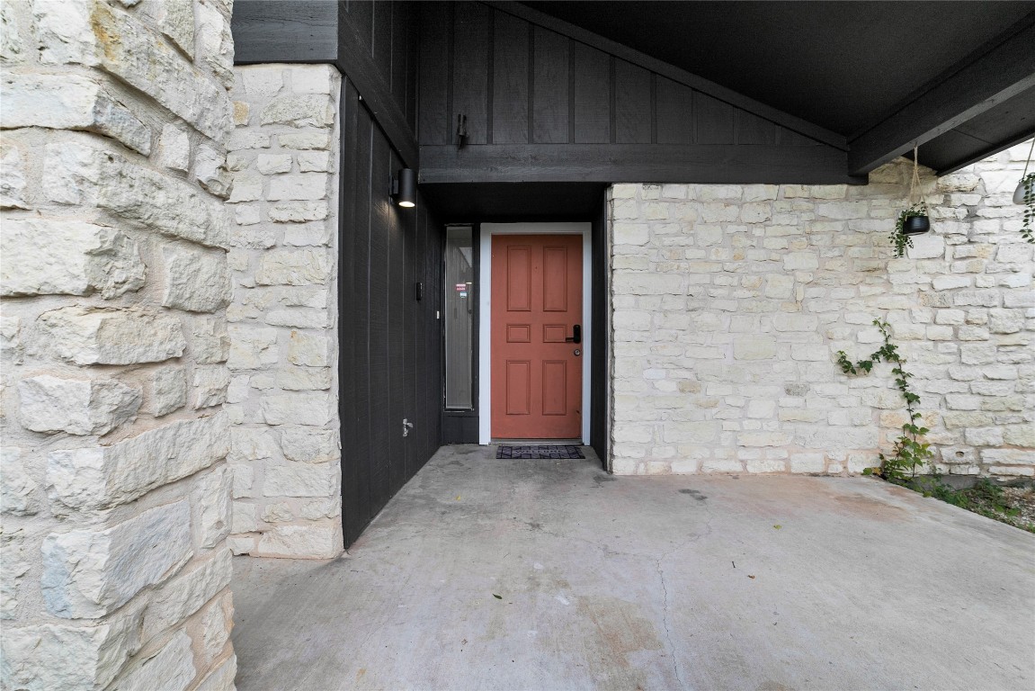 2009 Kenneth Avenue, Unit A Austin, TX 78741 - Photo 16 of 17 a view of a wooden door of the house