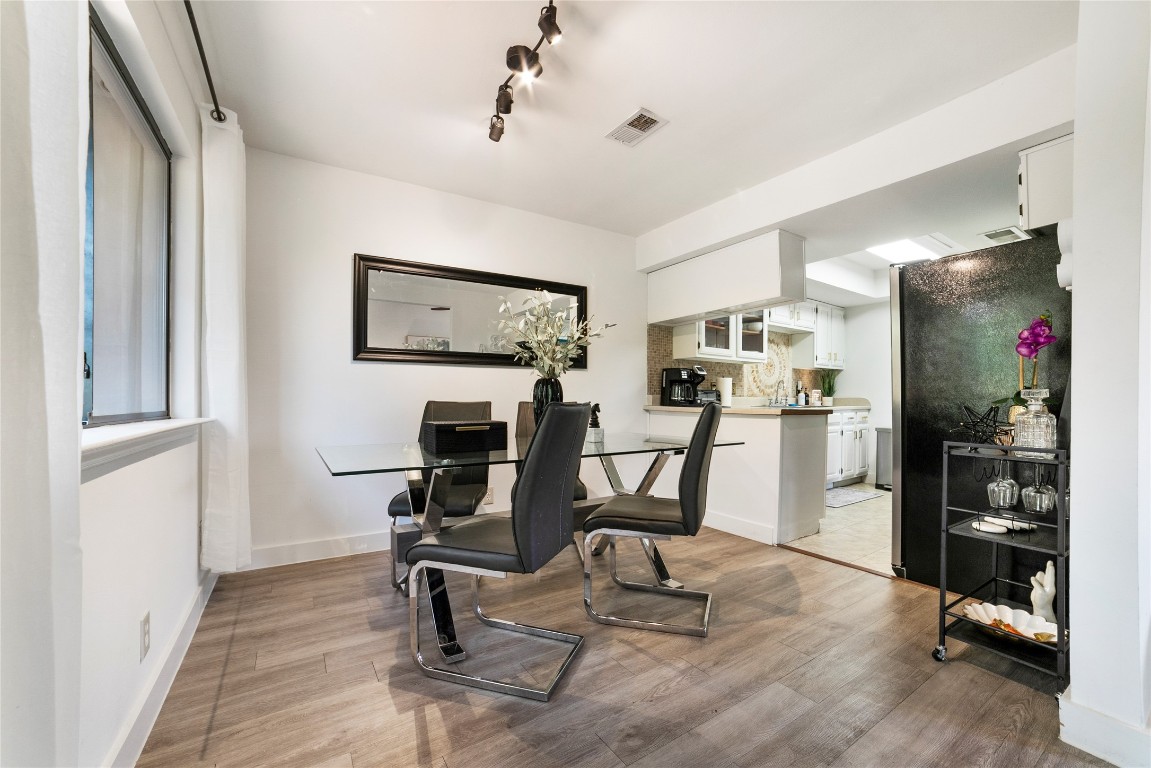 2009 Kenneth Avenue, Unit A Austin, TX 78741 - Photo 7 of 17 a view of a workspace with furniture and a window