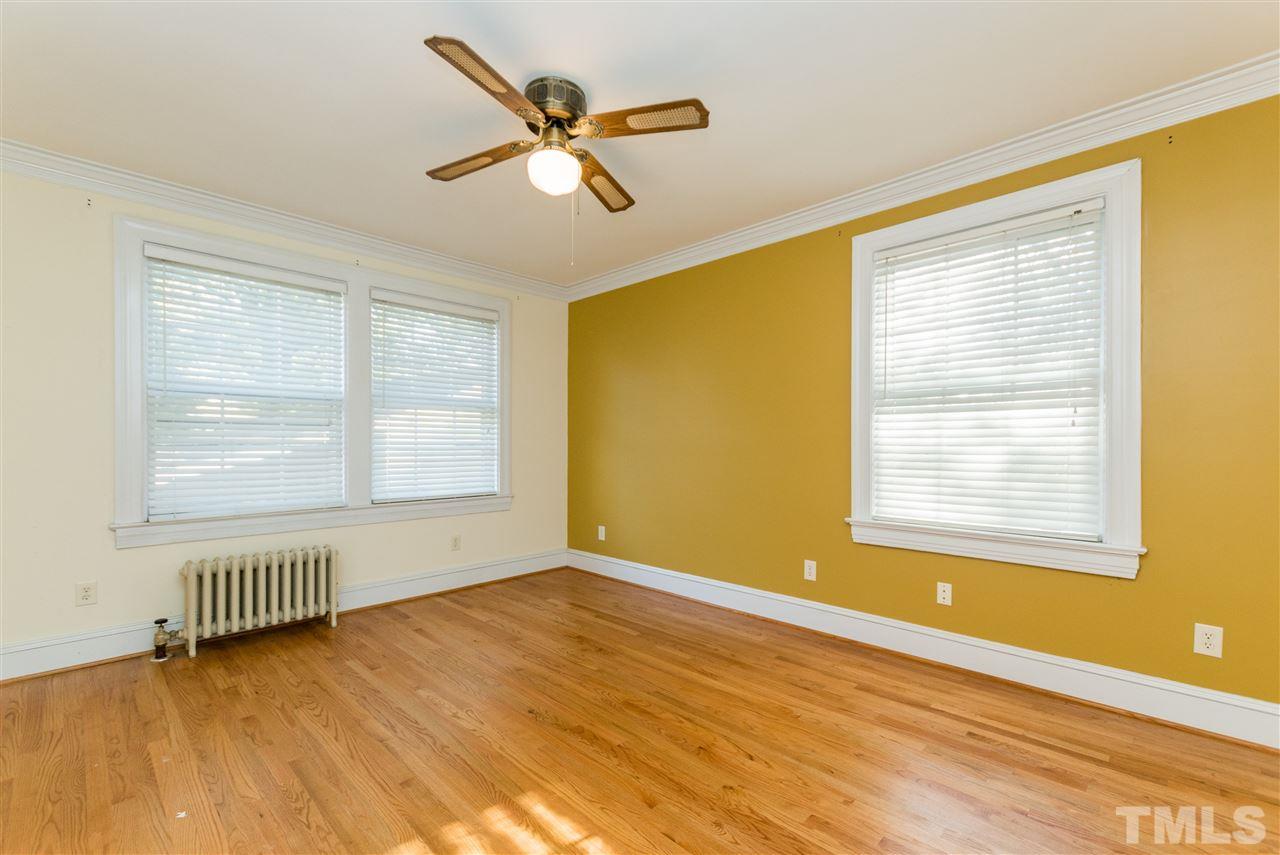 509 Burton Street Raleigh, NC 27608 - Photo 11 of 25 a view of an empty room with a window