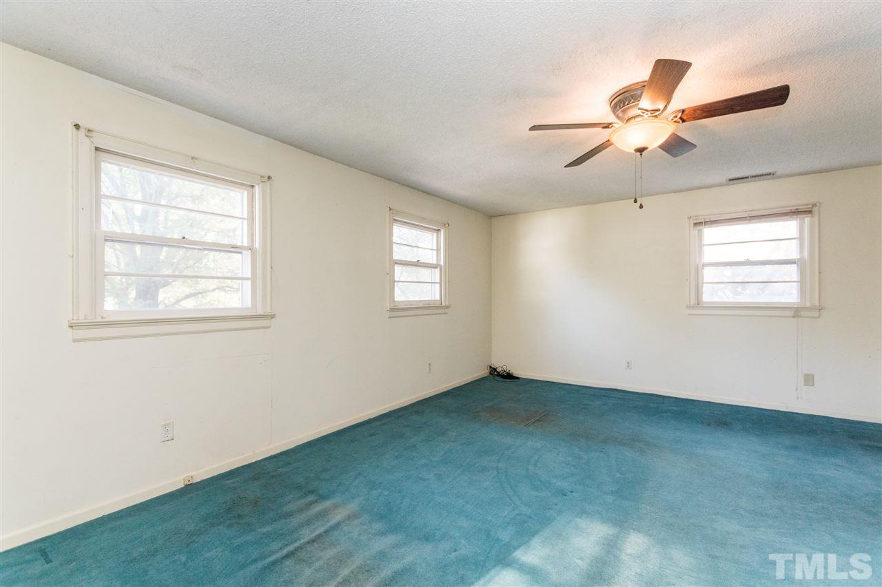 509 Burton Street Raleigh, NC 27608 - Photo 17 of 25 a view of an empty room with a window