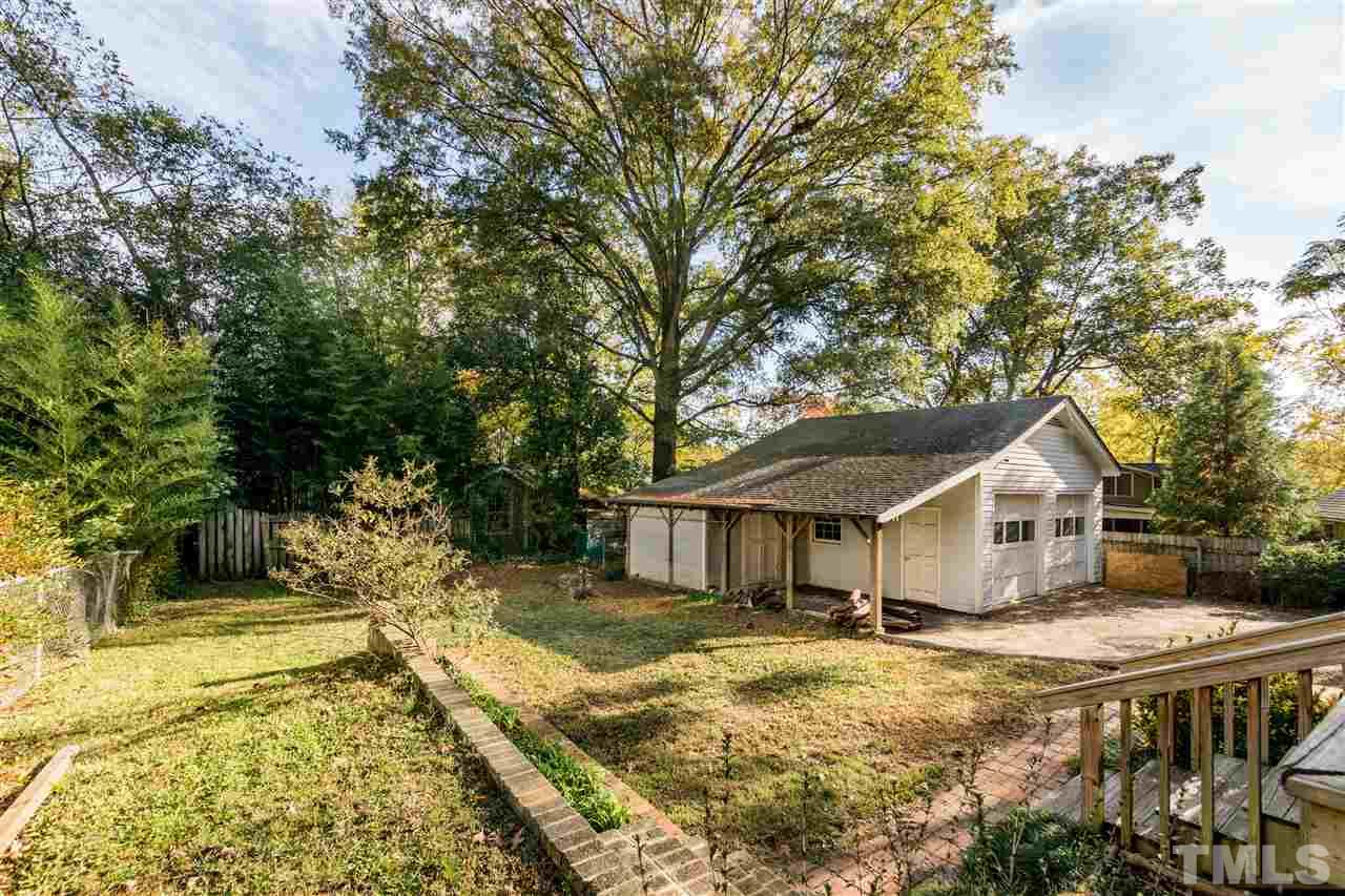 509 Burton Street Raleigh, NC 27608 - Photo 20 of 25 front view of a house with a yard