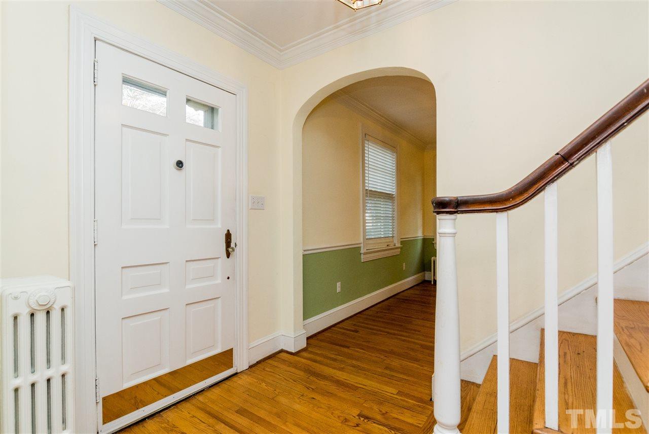 509 Burton Street Raleigh, NC 27608 - Photo 3 of 25 a view of front door with wooden floor