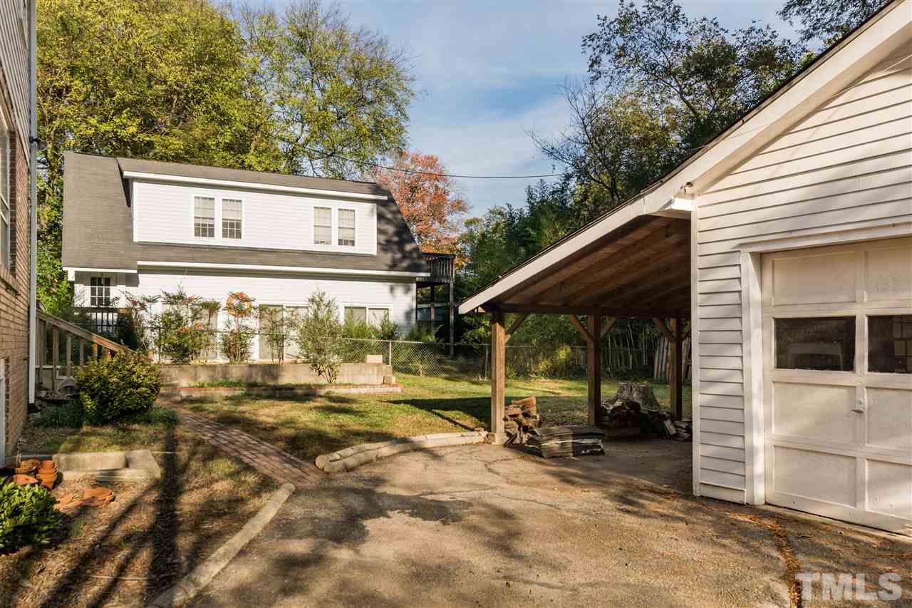 509 Burton Street Raleigh, NC 27608 - Photo 21 of 25 a view of a house with backyard and sitting area