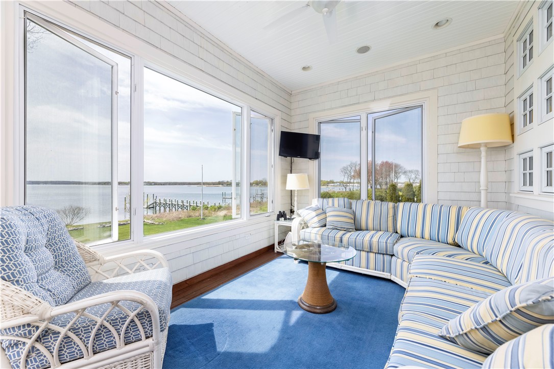 196 Channel View Warwick, RI 02889 - Photo 20 of 50 Relax in the sun porch and enjoy panoramic views.