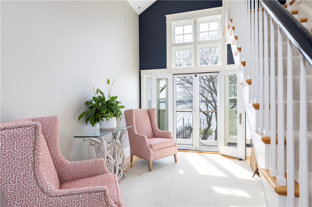 196 Channel View Warwick, RI 02889 - Photo 30 of 50 Beautiful sitting area at the top of the stairs with access to the deck.