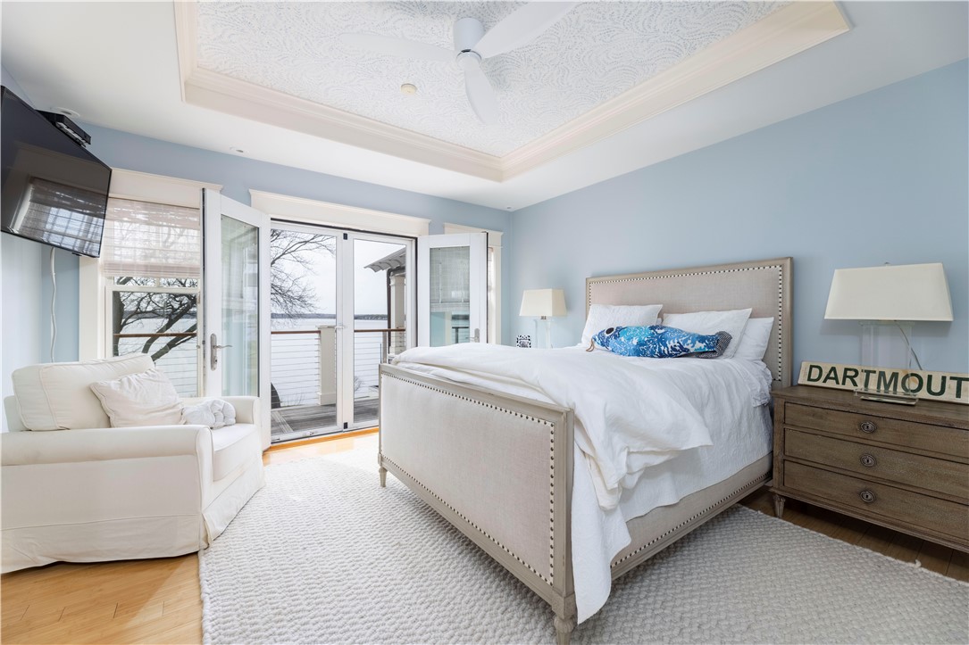 196 Channel View Warwick, RI 02889 - Photo 35 of 50 Beautiful bedroom with en-suite bath, walk in closet, and outdoor access.