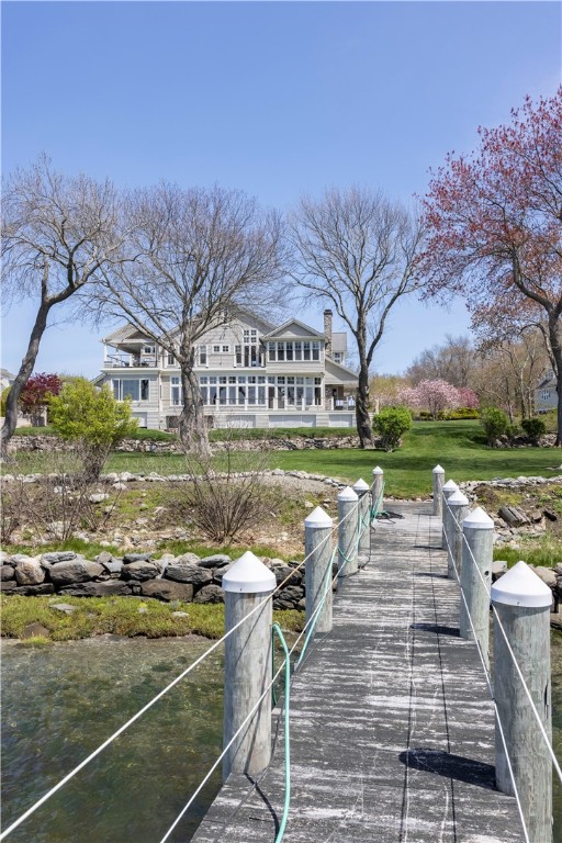 196 Channel View Warwick, RI 02889 - Photo 7 of 50 Views to the house from dock. The lot is elevated, does not need flood insurance.