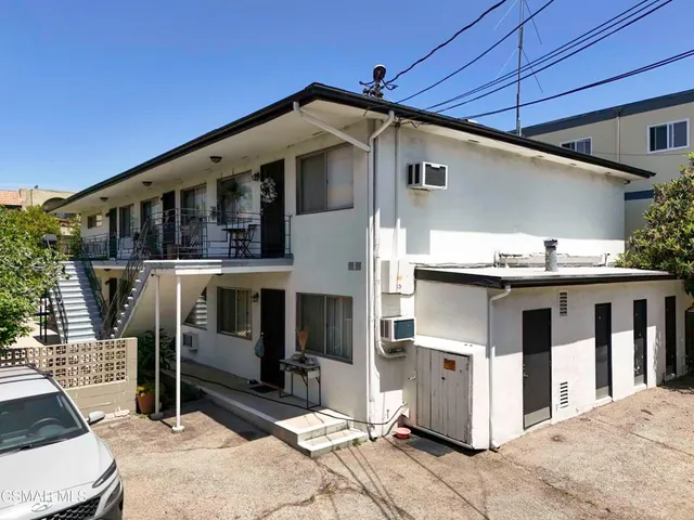 a front view of a house with balcony