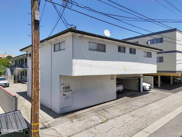 a view of a house with a street