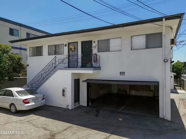 a view of house with outdoor space
