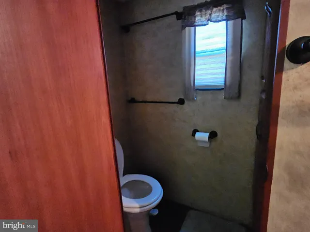 a bathroom with a sink and toilet