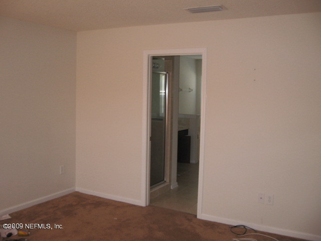 907 Silver Spring Court St. Augustine, FL 32092 - Photo 13 of 17 a view of an empty room