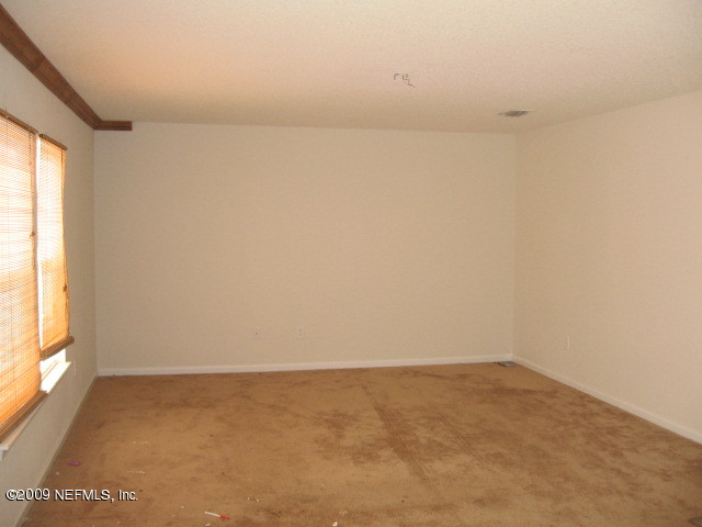 907 Silver Spring Court St. Augustine, FL 32092 - Photo 4 of 17 a view of an empty room