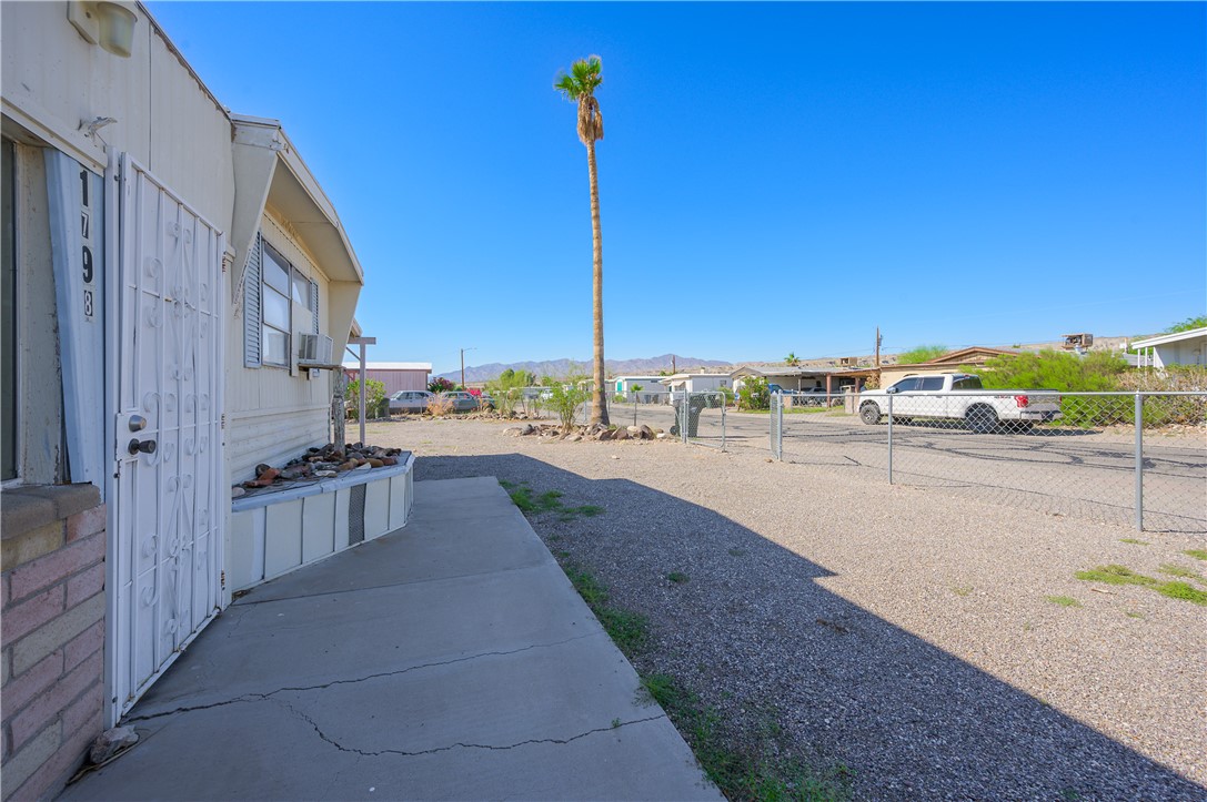 1798 Rio Grande Way Bullhead City, AZ 86442 - Photo 11 of 43 View of yard featuring a mountain view