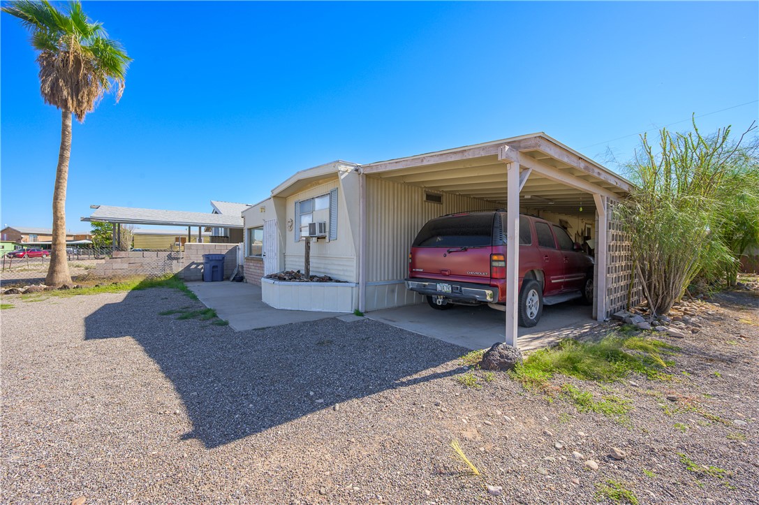 1798 Rio Grande Way Bullhead City, AZ 86442 - Photo 12 of 43 View of home's exterior with driveway
