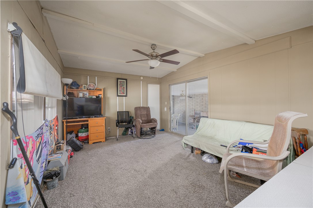 1798 Rio Grande Way Bullhead City, AZ 86442 - Photo 16 of 43 Carpeted bedroom featuring access to outside and a ceiling fan