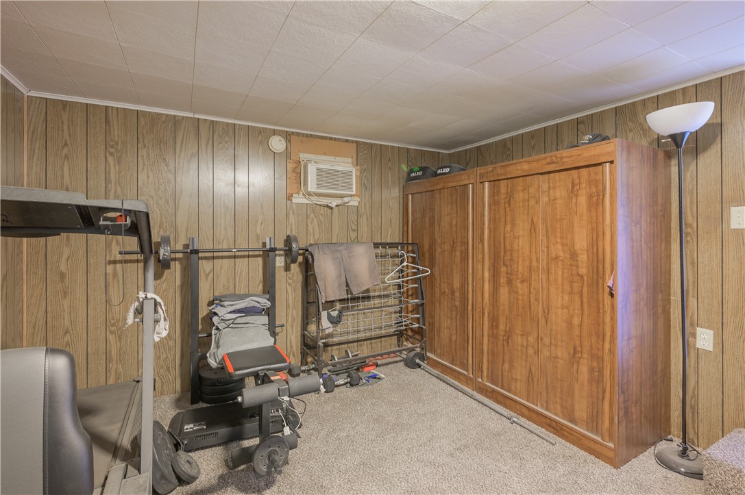 1798 Rio Grande Way Bullhead City, AZ 86442 - Photo 22 of 43 Workout area with wooden walls and light colored carpet