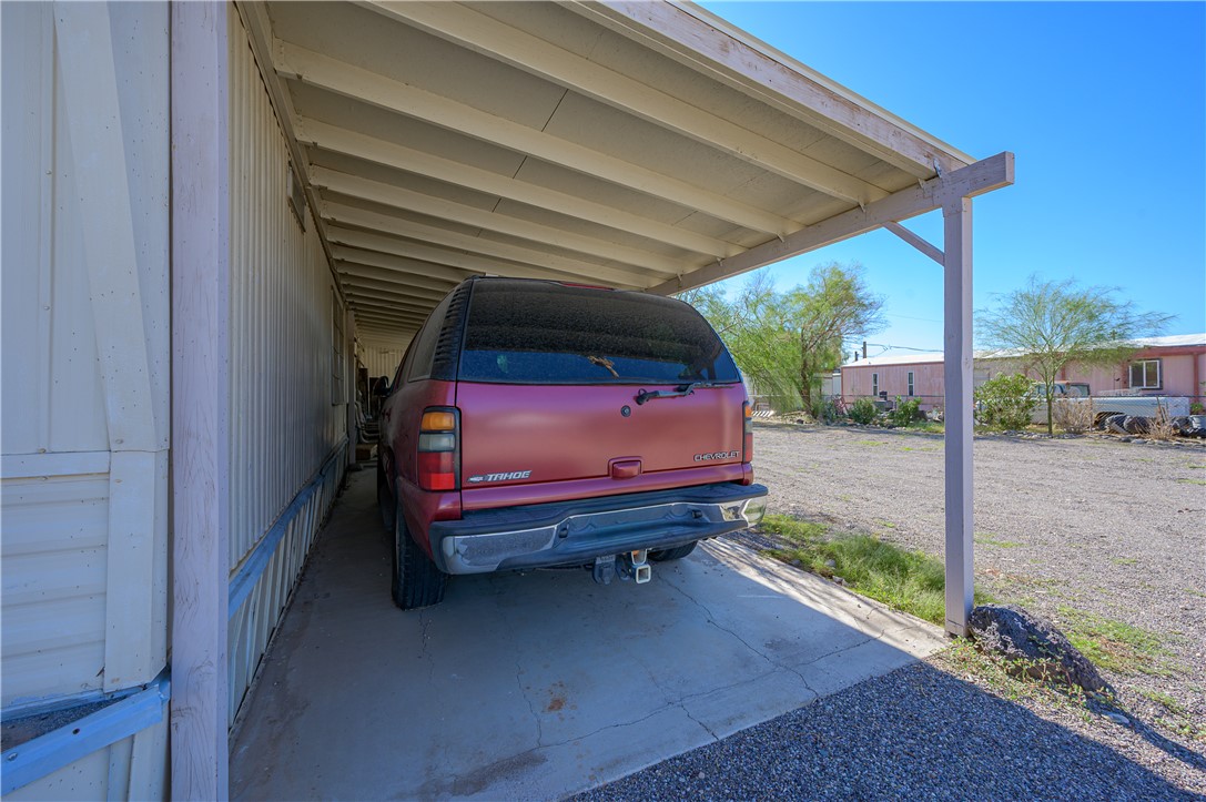 1798 Rio Grande Way Bullhead City, AZ 86442 - Photo 32 of 43 View of parking with an attached carport