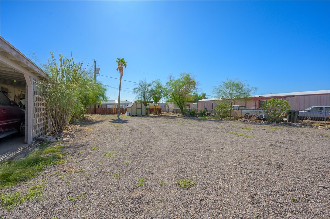 1798 Rio Grande Way Bullhead City, AZ 86442 - Photo 34 of 43 View of yard with a storage shed