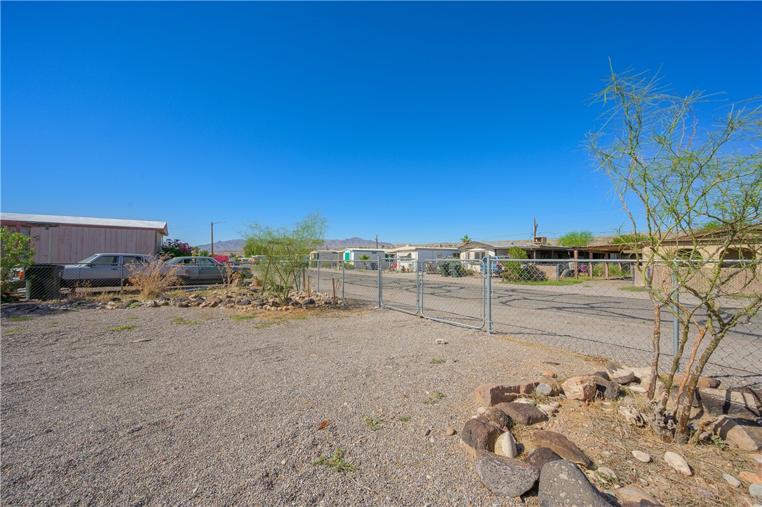 1798 Rio Grande Way Bullhead City, AZ 86442 - Photo 35 of 43 View of yard with a gate