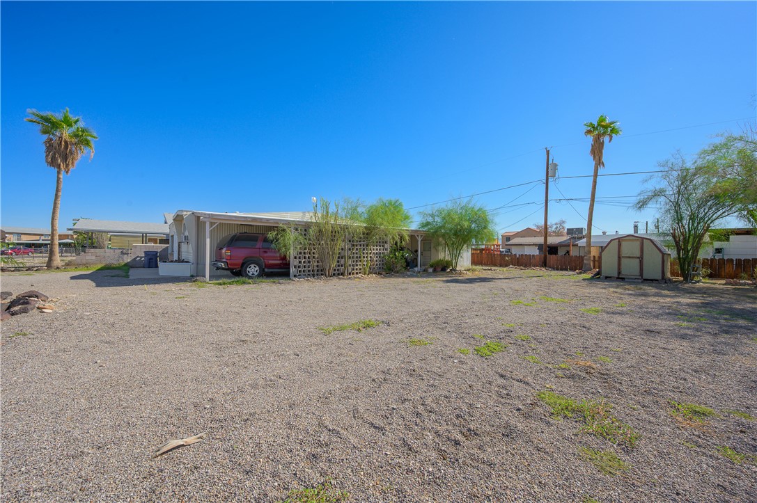1798 Rio Grande Way Bullhead City, AZ 86442 - Photo 36 of 43 View of yard with a storage unit