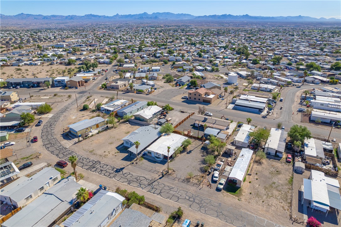 1798 Rio Grande Way Bullhead City, AZ 86442 - Photo 5 of 43 Aerial view of property and surrounding area featuring nearby suburban area