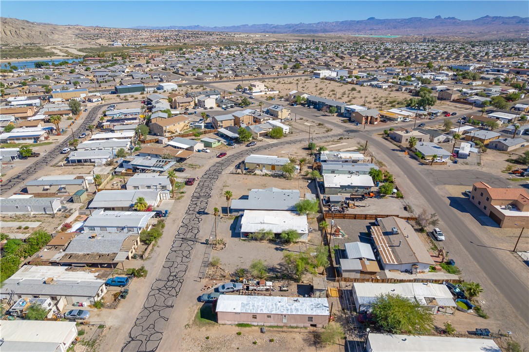 1798 Rio Grande Way Bullhead City, AZ 86442 - Photo 7 of 43 Aerial perspective of suburban area with a mountainous background