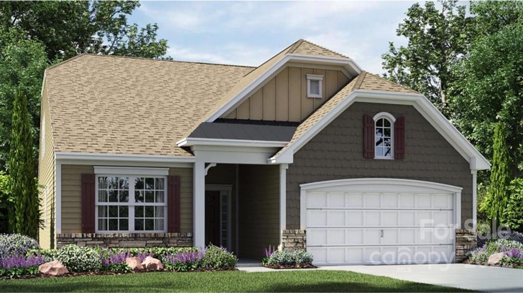 3159 Windhaven Lane, Unit 81 Tega Cay, SC 29708 - Photo 1 of 6 a front view of a house with a garden