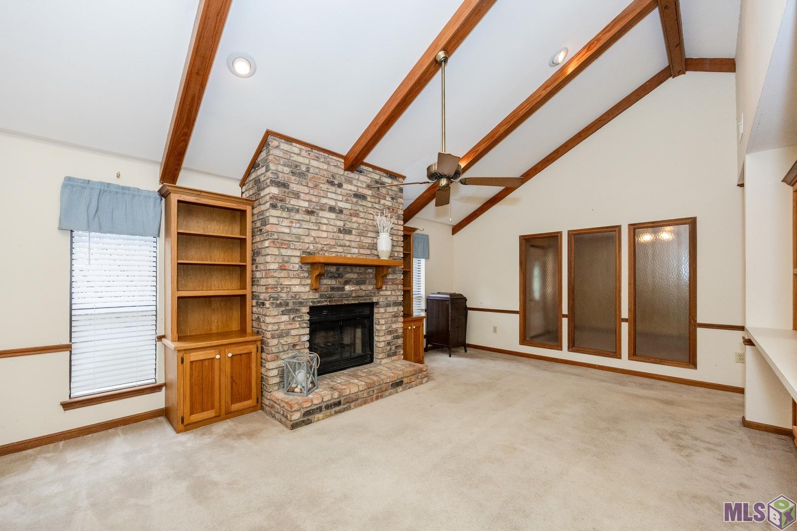 Vaulted Ceilings and Built In Bookshelves