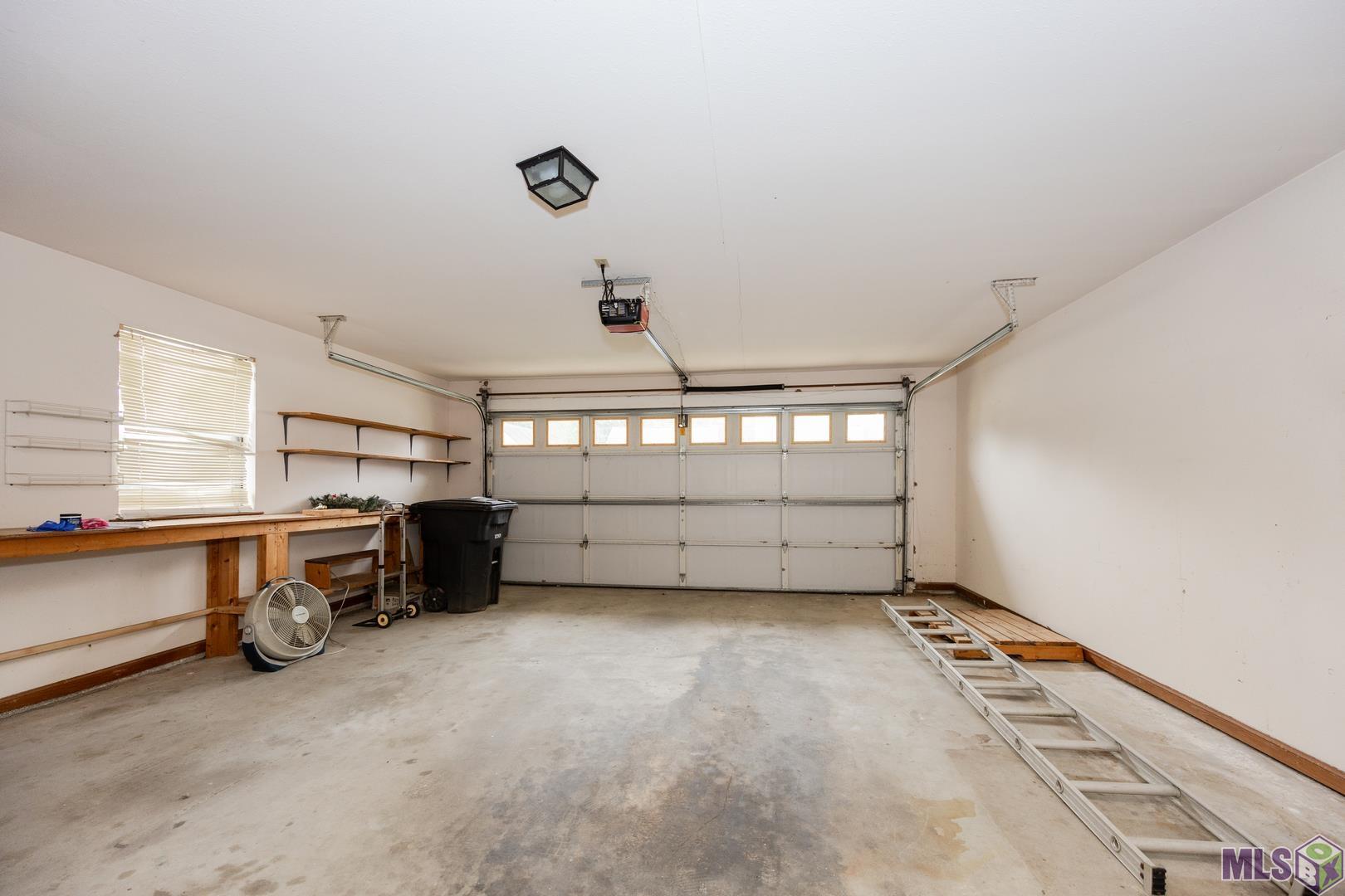 15465 Summerwood Avenue Baton Rouge, LA 70817 - Photo 30 of 31 2 car garage with 2 storage rooms