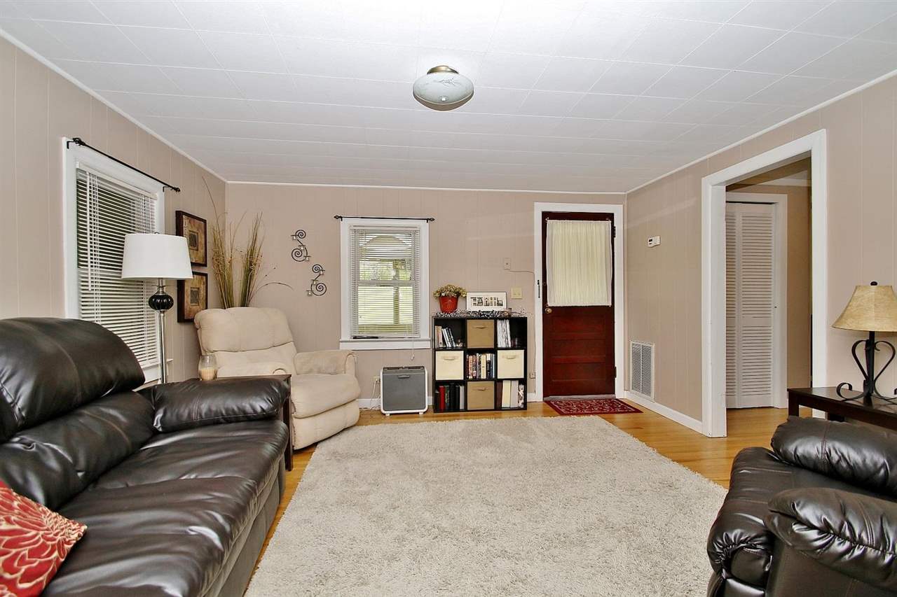 4825 Break Heart Road Crozet, VA 22932 - Photo 6 of 24 a living room with furniture and a wooden floor