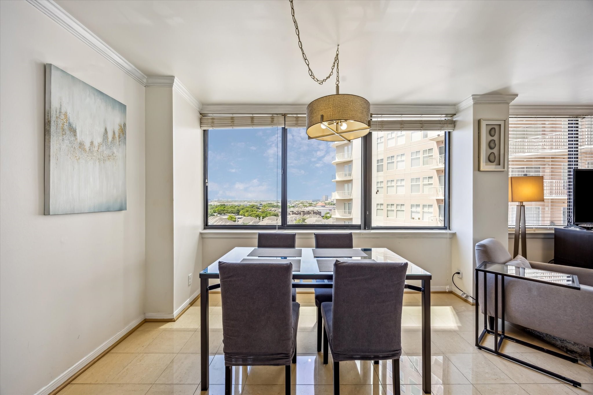 3525 Sage Road, Unit 1010 Houston, TX 77056 - Photo 15 of 34 The dining area, featuring chandelier lighting, is perfect for both casual and formal entertaining.