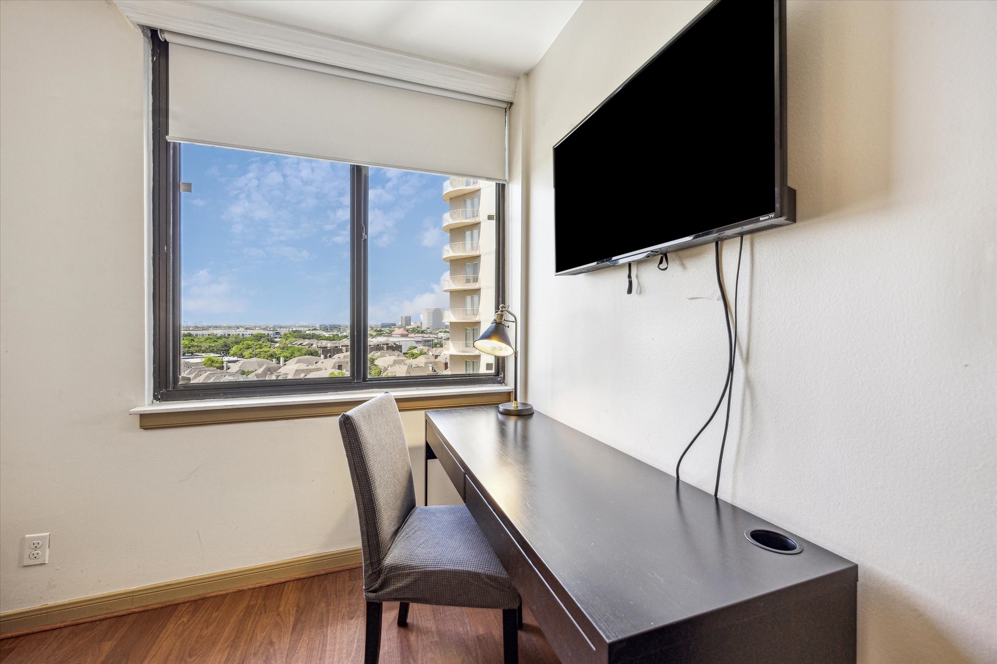 3525 Sage Road, Unit 1010 Houston, TX 77056 - Photo 20 of 34 The spacious primary bedroom offers enough room to include a desk or workspace.
