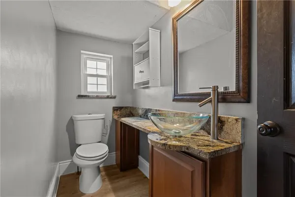 a view of a bathroom with a sink and a toilet