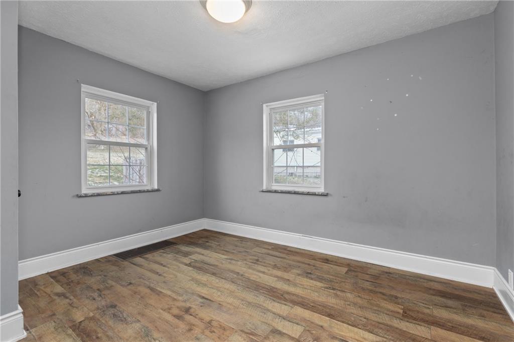 41 Bethlehem Street Fredericktown, PA 15333 - Photo 19 of 33 a view of a room with wooden floor and windows