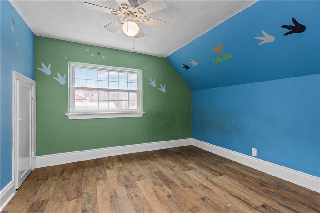 41 Bethlehem Street Fredericktown, PA 15333 - Photo 22 of 33 a view of a room with wooden floor and windows