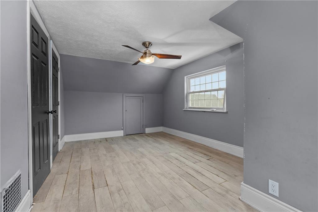 41 Bethlehem Street Fredericktown, PA 15333 - Photo 25 of 33 a view of an empty room with a window